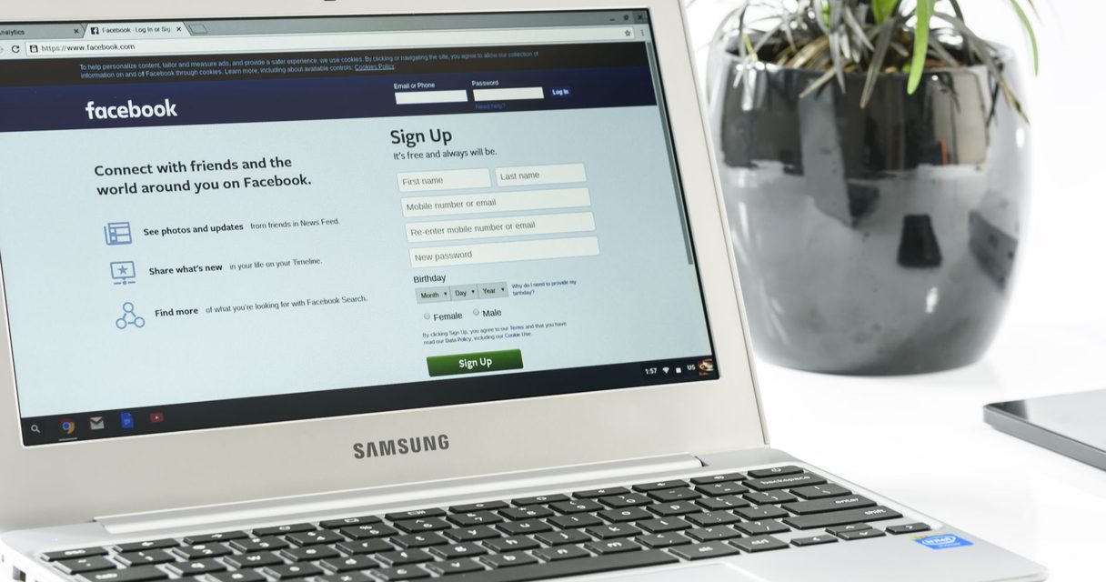 Laptop open on a signup form โ Roobet signup walkthrough