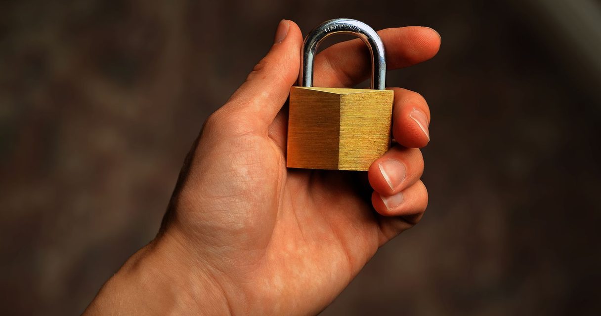 Padlock over circuit board โ crypto security for players